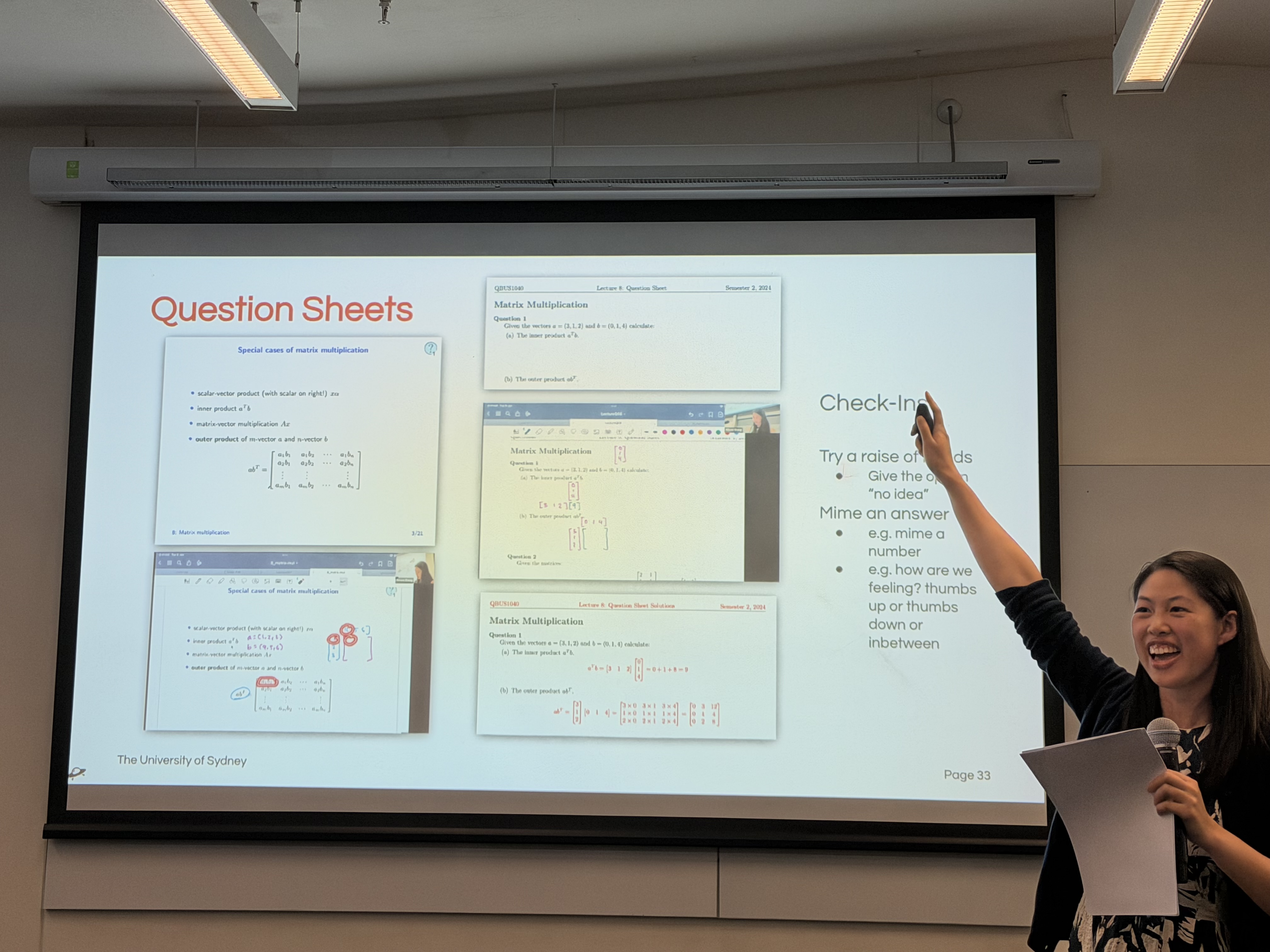 Alison Wong presenting a slide about question sheets at UNSW