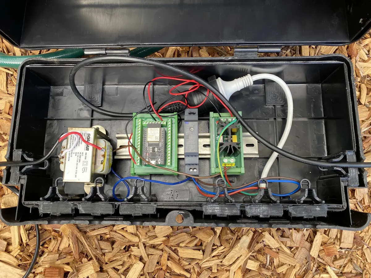 ESPHome sprinkler controller inside an outdoor irrigation box